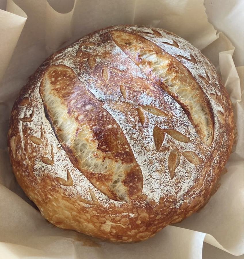 A freshly baked sourdough loaf